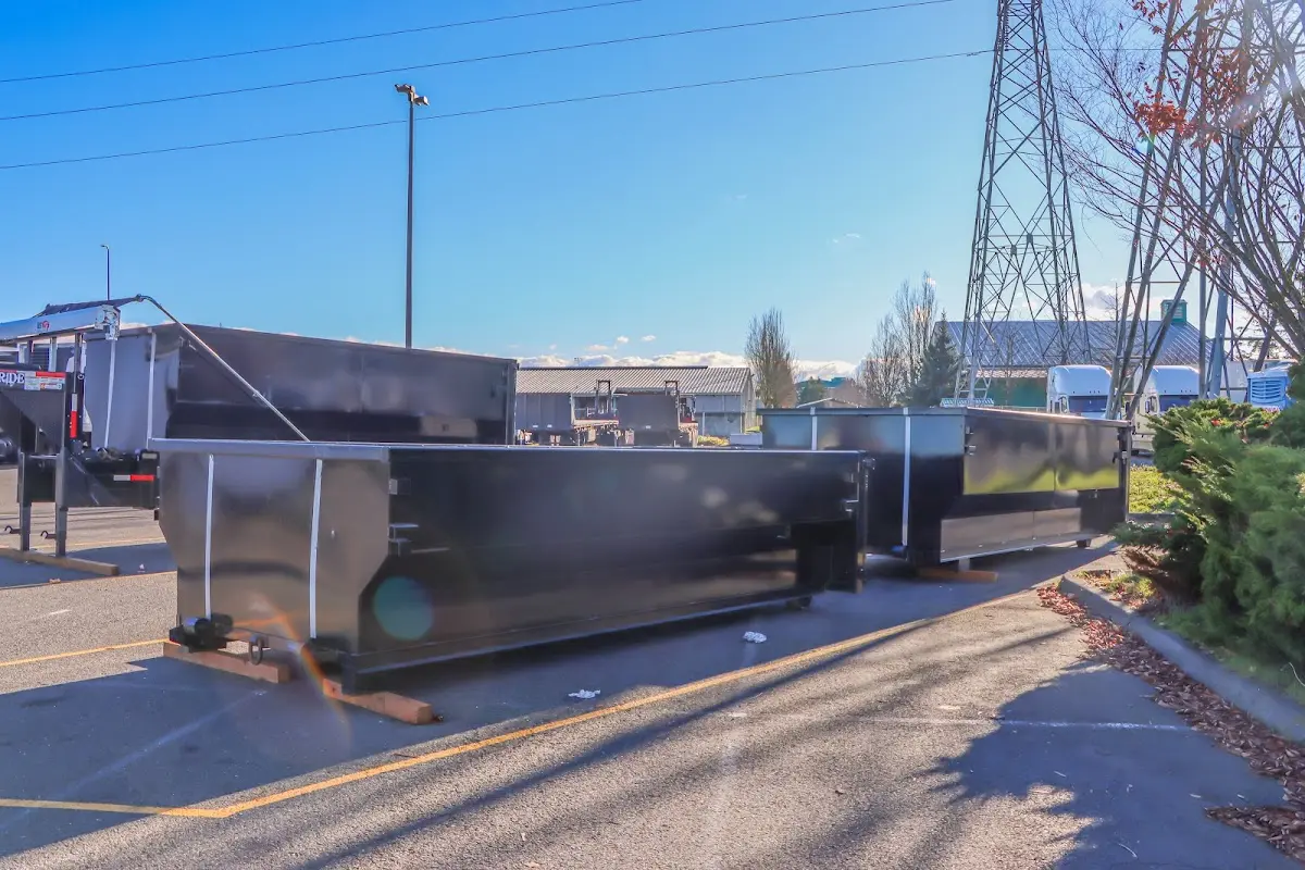 Roll-off dumpster ready for waste disposal at job site for Commercial Dumpster Rental in Williams